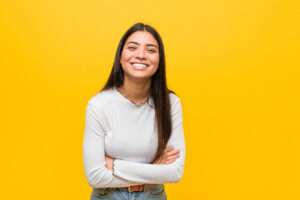 smiling woman on yellow background